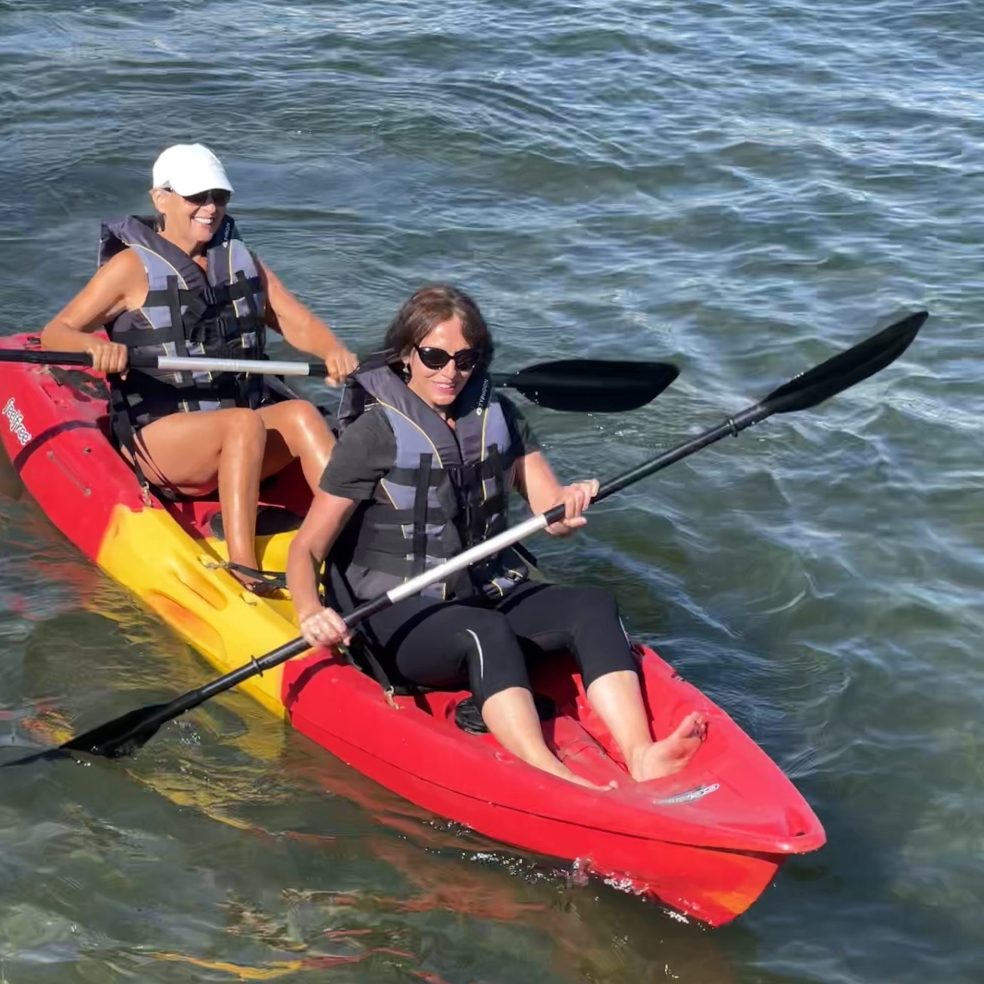 2 women in canoe